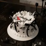 white vintage ribbon butterfly cake