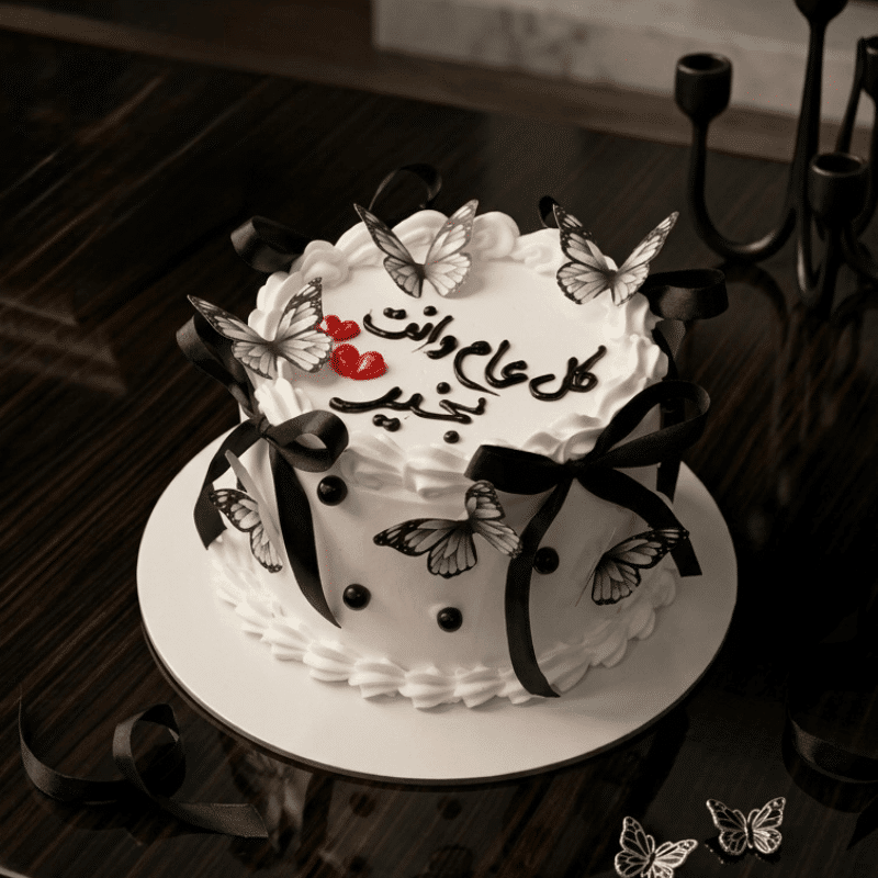 white vintage ribbon butterfly cake