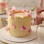 pleated ivory cake